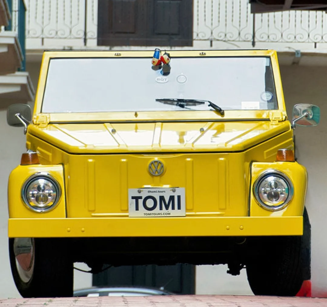 Tomi Tours yellow VW Safari on the streets of Panama City